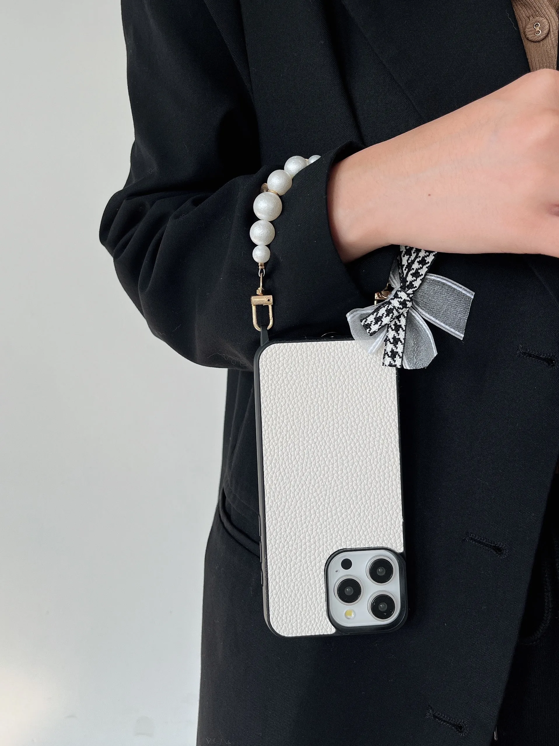 Grain Leather iPhone Case with Anti Fall Hand Bracelet